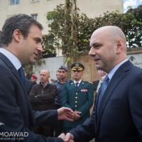 Deputy Prime Minister Ghassan Hasbani lays wreaths of flowers at the assassination site of President Rene Moawad in Zarif