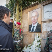 Ramzi Jreij lays wreaths of flowers at the assassination site of President Rene Moawad in Zarif