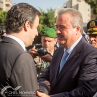 Yassine Jaber lays wreaths of flowers at the assassination site of President Rene Moawad in Zarif